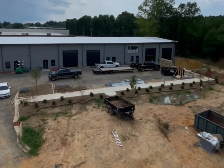 Metal flex buildings and site work seen from a lift, flex space construction
